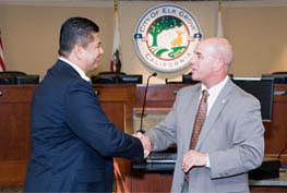 Mayor's shaking hands.